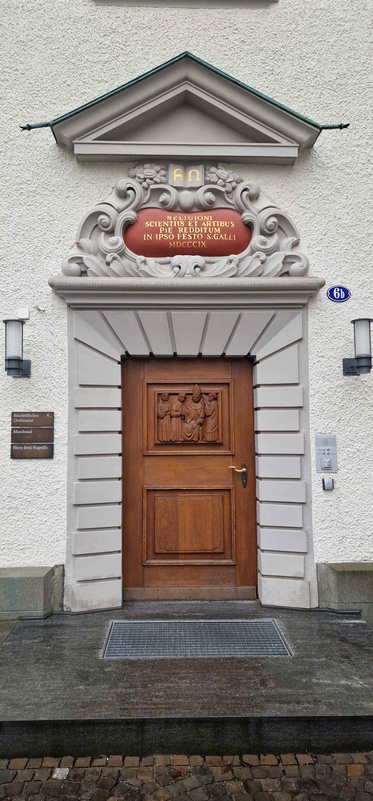 A clear view of the Abbey Library portal, tying the building to its baroque façade and historic entrance.