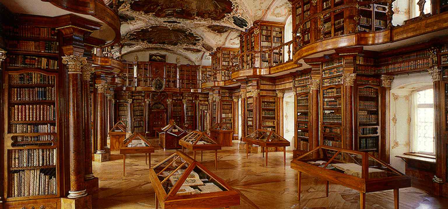 The iconic Baroque library hall, often described as one of the world’s most beautiful library interiors.