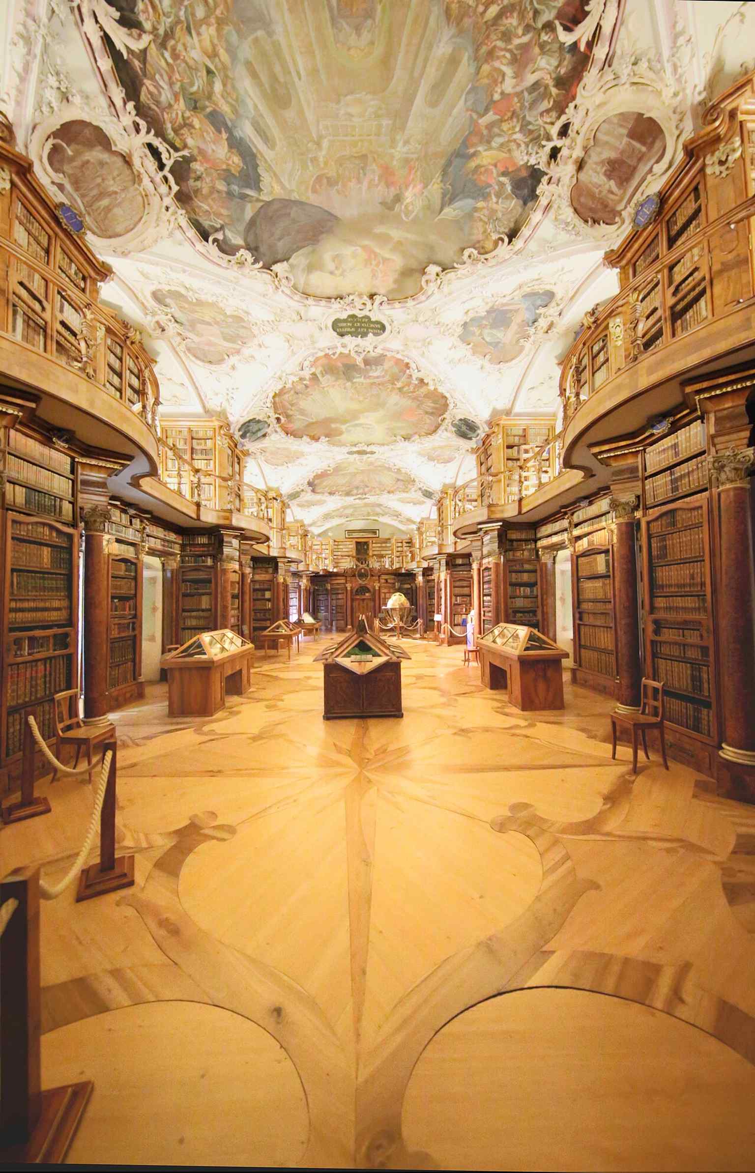 The grand reading hall without visitors, showing the elegant woodwork and the quiet museum atmosphere.