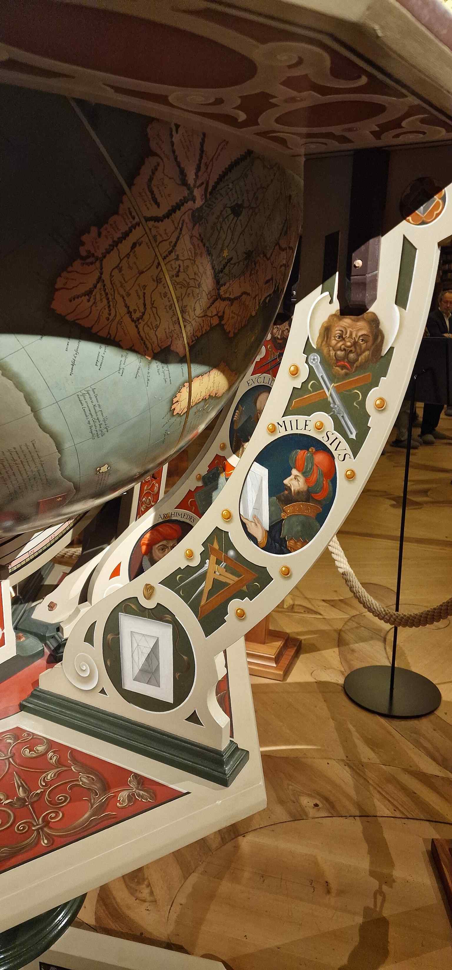 Another view of the replica globe, recalling the original 16th-century world and celestial globe now symbolically returned.