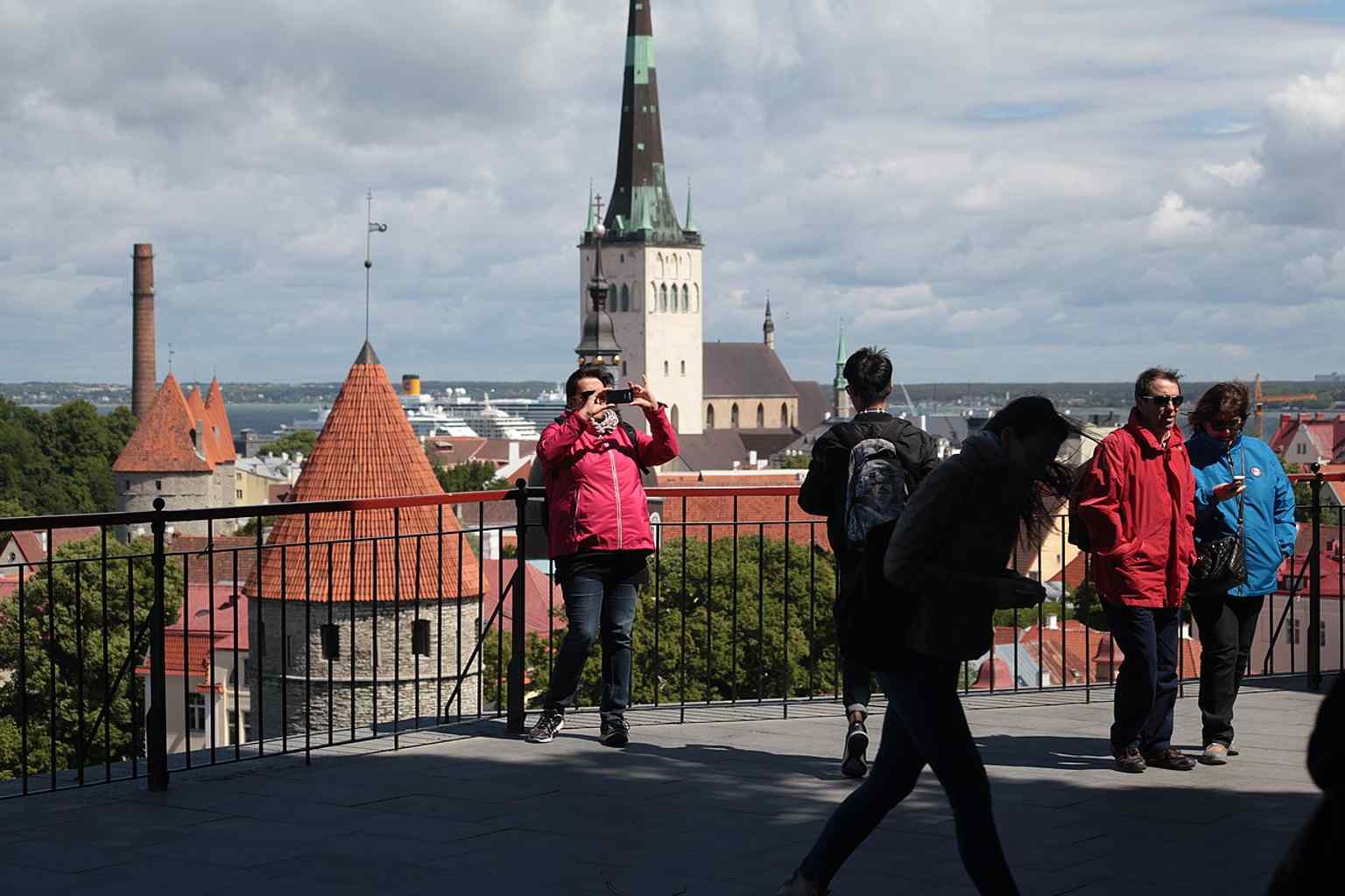 A busy tourist viewpoint over Old Town, reflecting its modern life as a popular heritage district as well as a neighborhood.