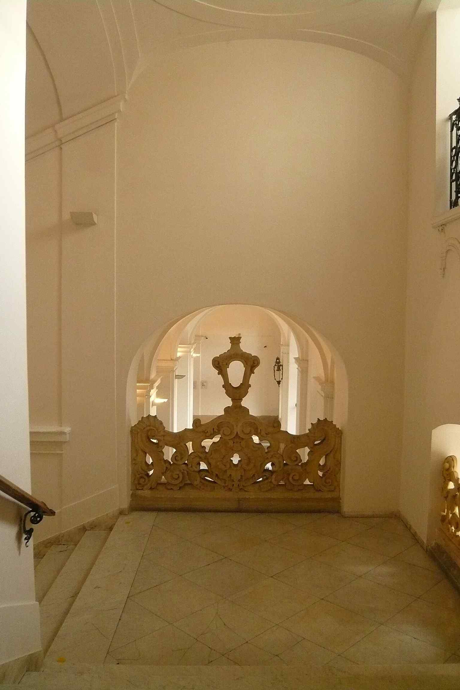 The grand main staircase from the baroque palace, one of the most representative surviving interior spaces.