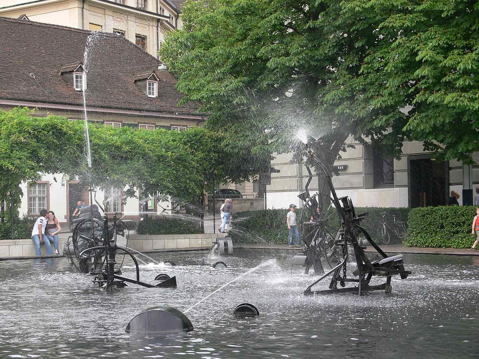 A wider daytime view of the Carnival Fountain in its setting on Theaterplatz, where the old theatre once stood.