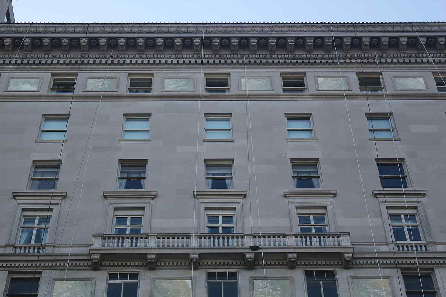 A close-up of the building's distinctive terra cotta cornice, part of the detailed design that aimed to attract New York's wealthiest residents.