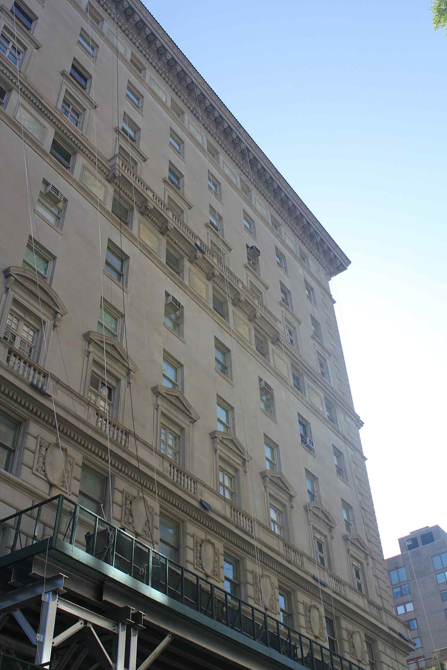 A close-up highlighting the quality of the limestone facade, reflecting the architect's 'unlimited permission' to use the best materials, including two-foot thick fireproof walls.