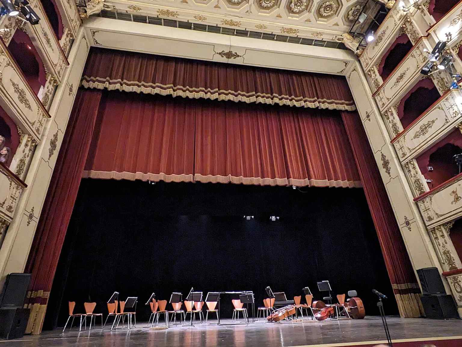 The auditorium interior, echoing the theatre’s horseshoe layout with four tiers of boxes described in its 19th-century design.