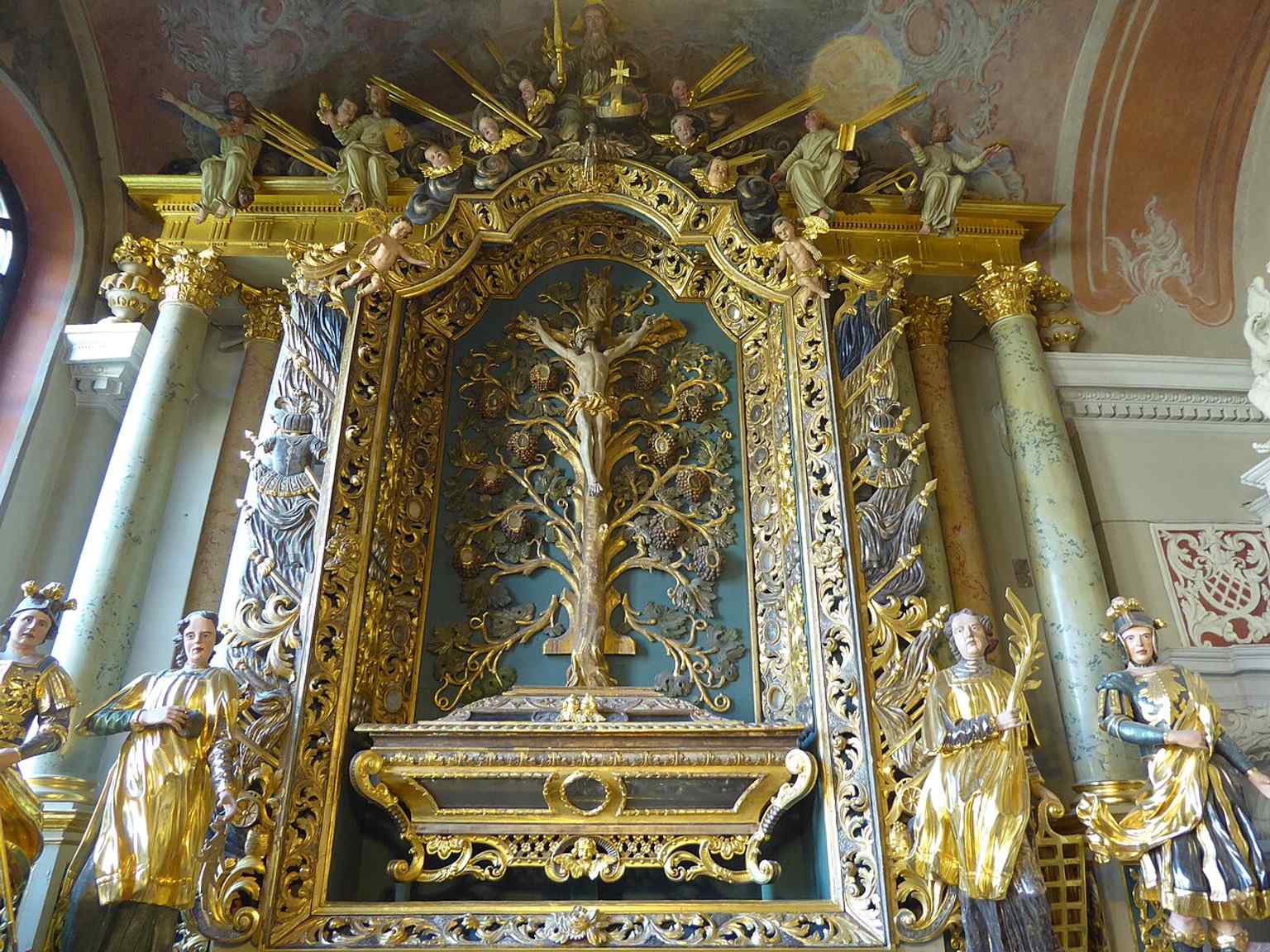 A side altar inside St. John’s Church, echoing the many chapels and altars that once filled the presbytery before the 19th-century simplification.