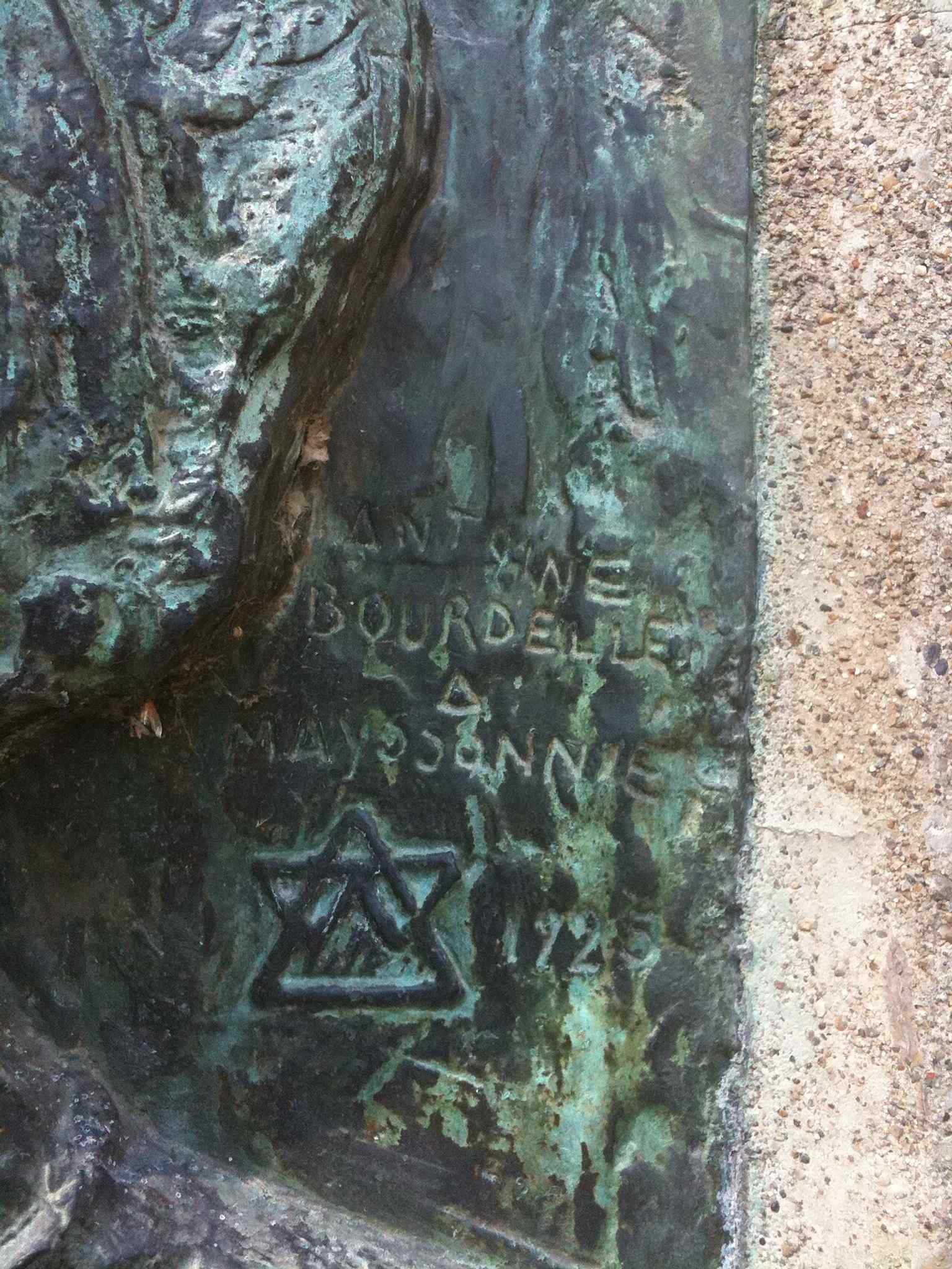 A detail shot that can help highlight Bourdelle’s bronze surface and signature, tying the work to the sculptor himself.