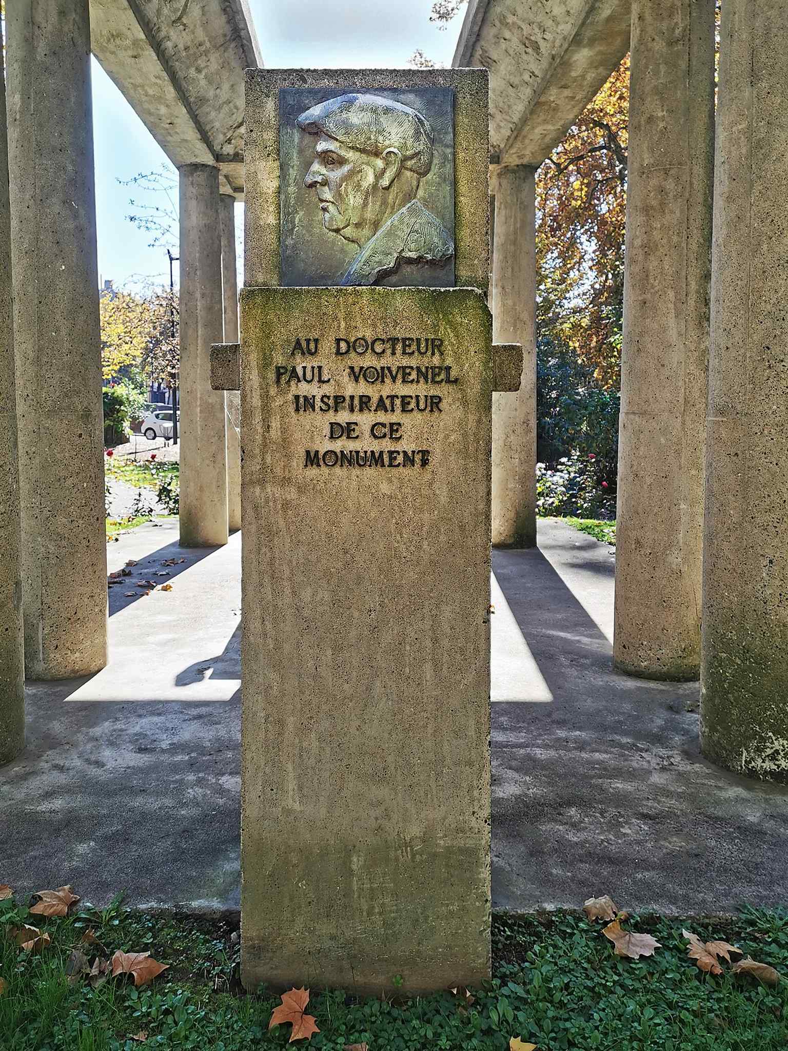 The stèle for Paul Voivenel beside Hercules the Archer, showing how the monument evolved into a broader tribute to the people behind the memorial.