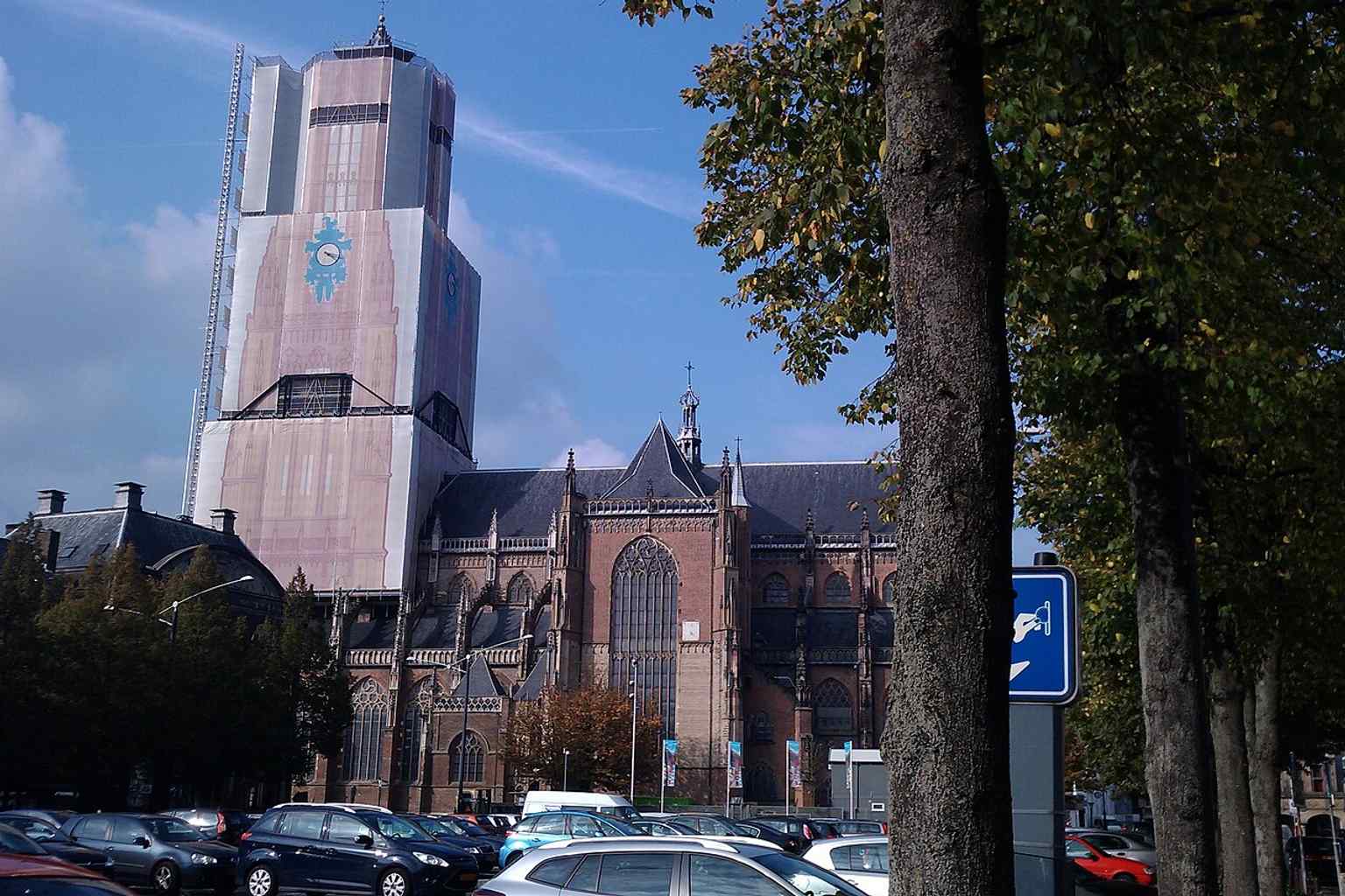 The Eusebiustoren from a street-level angle, helping place the church in the city center around Kerkplein.