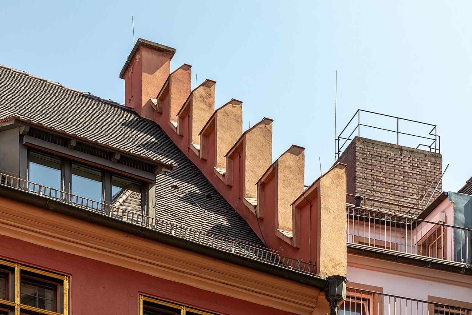 The red-gabled front of the House of the Whale on Franziskanerstraße — the landmark’s most recognizable late-Gothic facade in Freiburg’s old town.