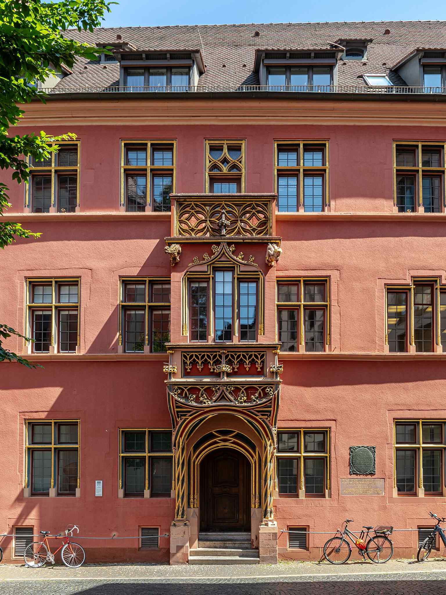 The entrance to the House of the Whale, where the building’s story ties together its Renaissance origins and later bank conversion.