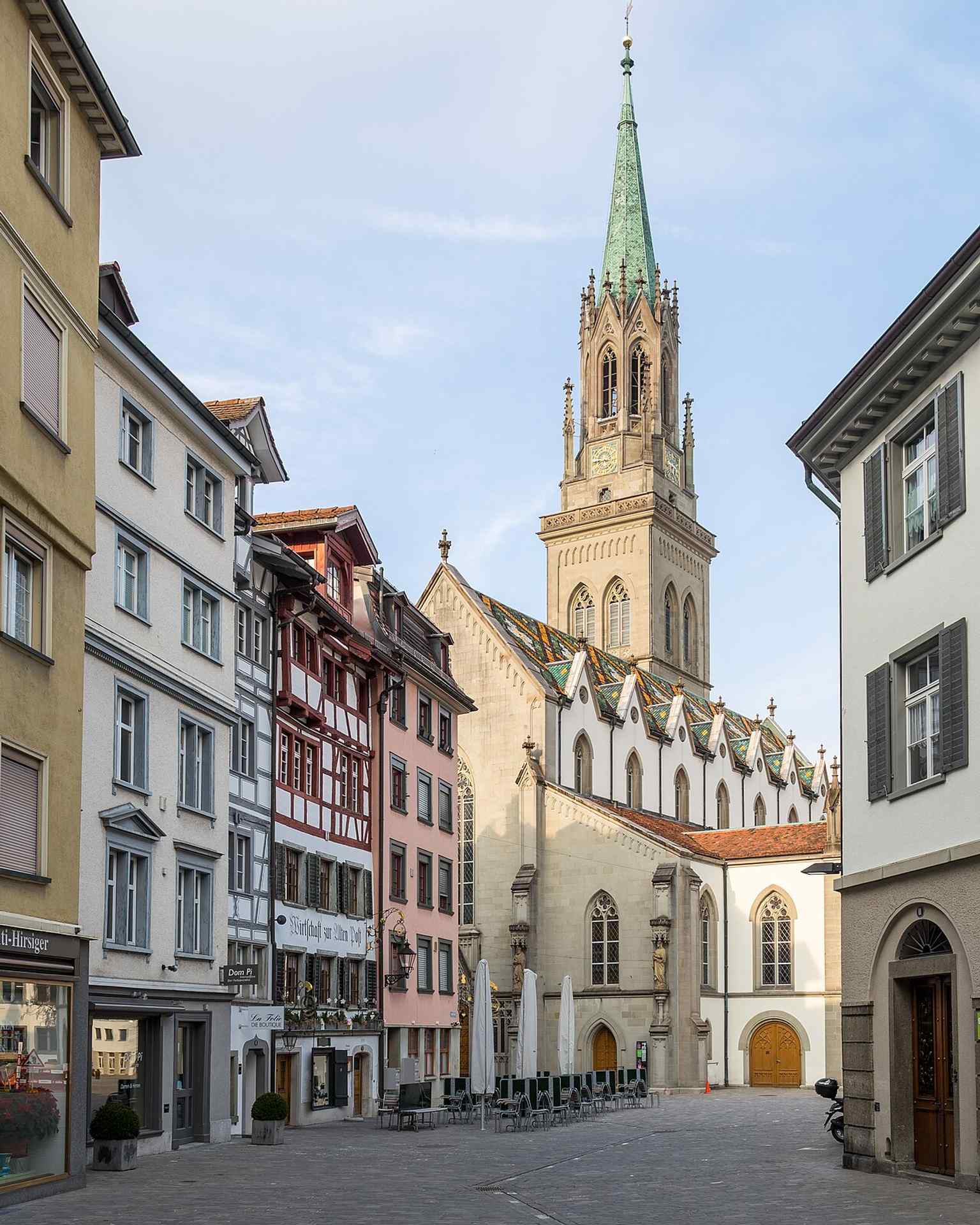 Seen from Gallusstrasse, this view emphasizes the church’s urban setting and the tower that was rebuilt after the mid-19th-century renovation.