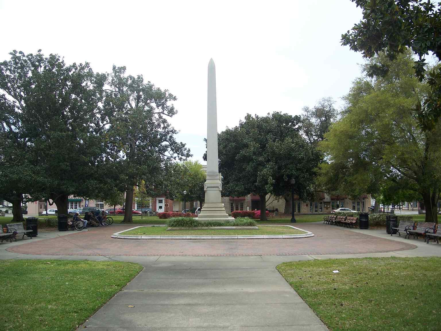 A serene view of Plaza Ferdinand VII from 2008, showcasing the grassy park that serves as a historic centerpiece for Pensacola.