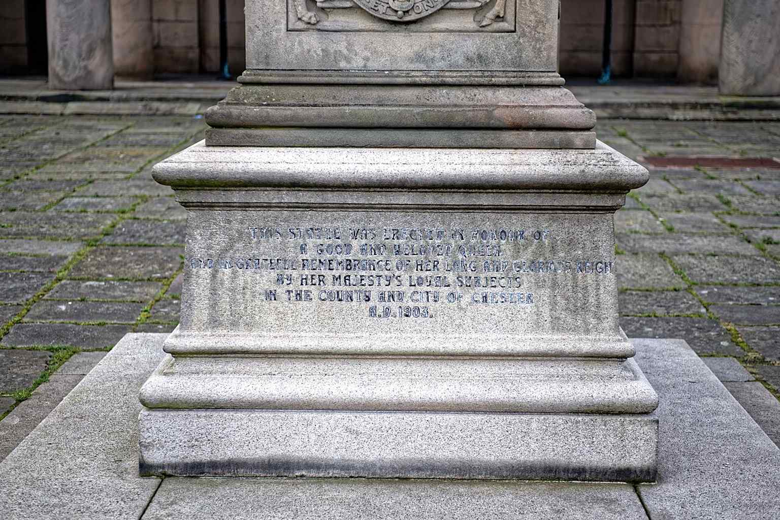 A closer view of the statue and pedestal, showing the listed memorial in Chester Castle’s forecourt and its formal Victorian styling.