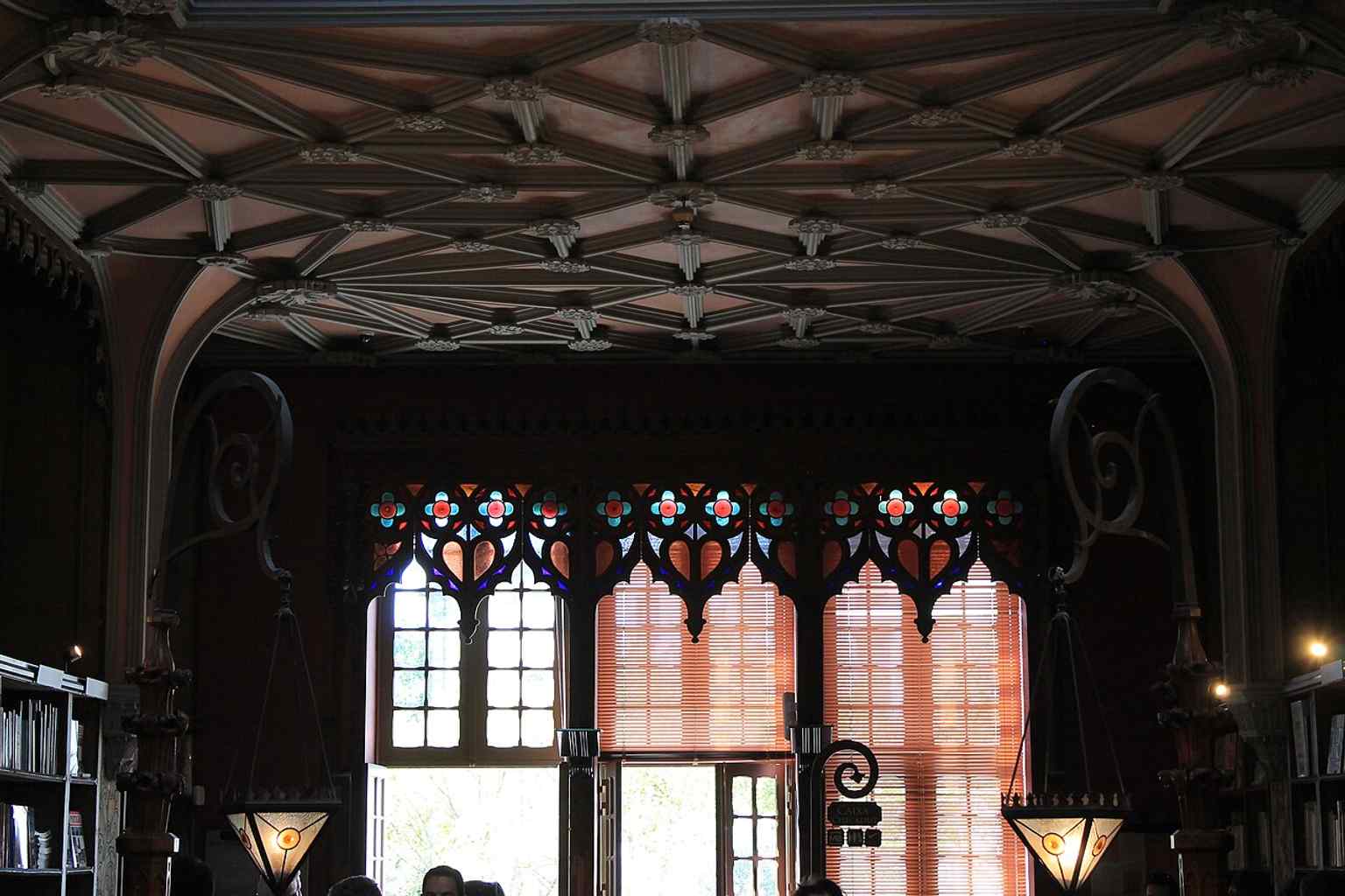 A deep view into the reading space, useful for showing the bookstore’s restored interior and its atmosphere as a living cultural venue.