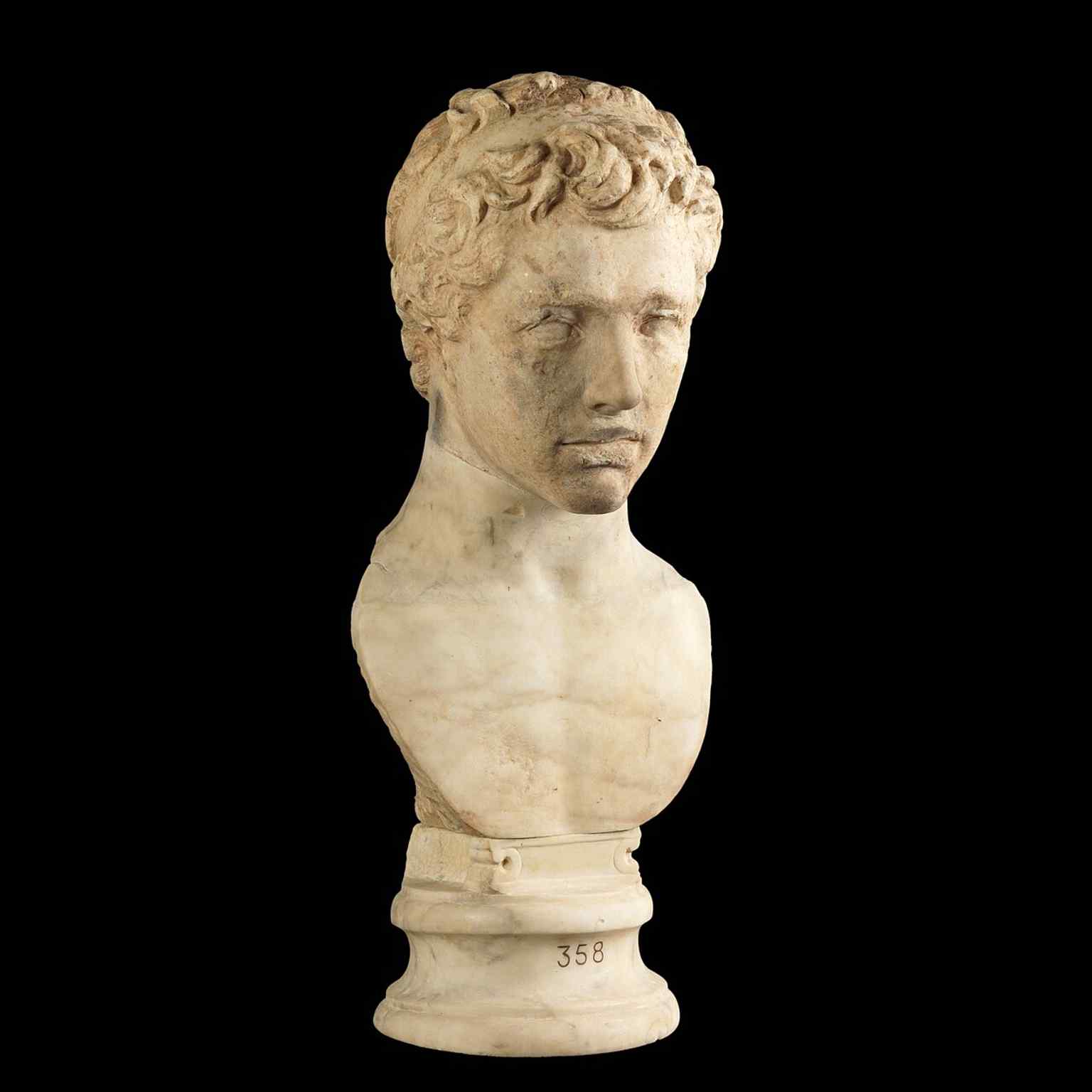A Roman imperial bust from the sculpture collection, echoing the Prado's roots in royal antiquities and classical art.