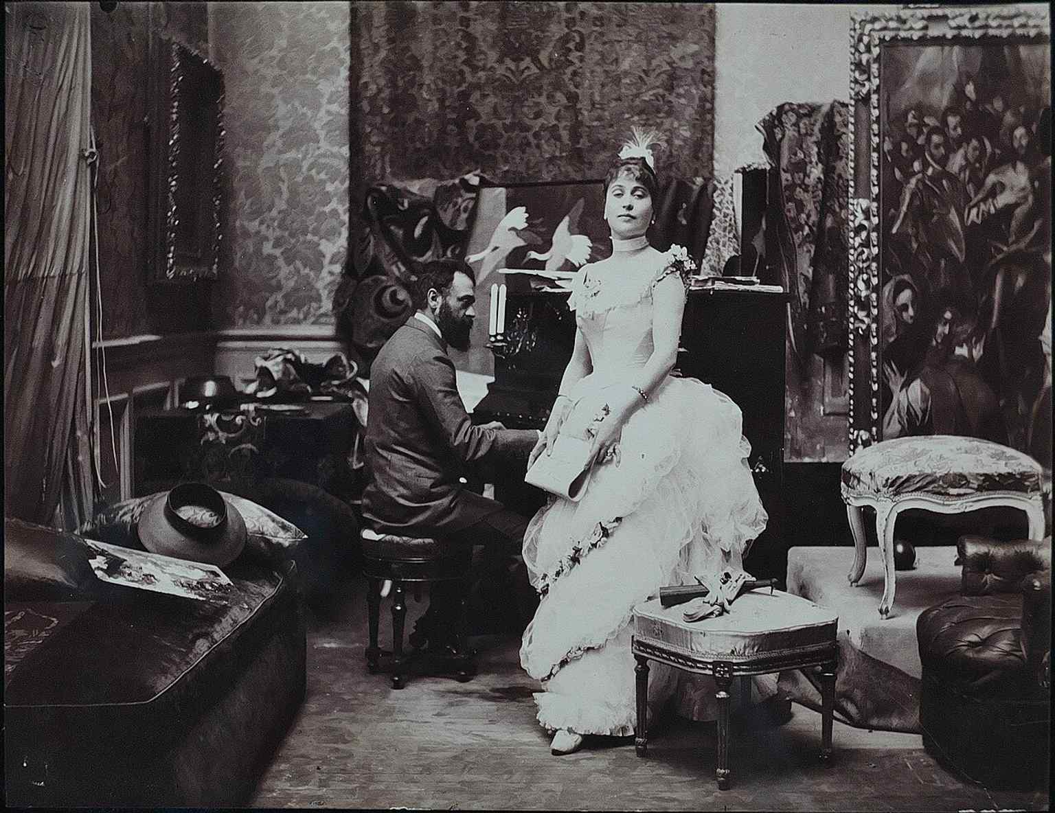 A historic studio photograph from the museum archive, evoking the Prado as a working place for artists and copists.