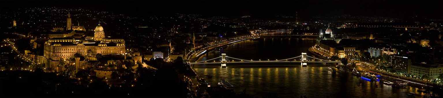 A panoramic view of Budapest from Gellért Hill, featuring Matthias Church and the Buda Castle District, demonstrating its prominent location.