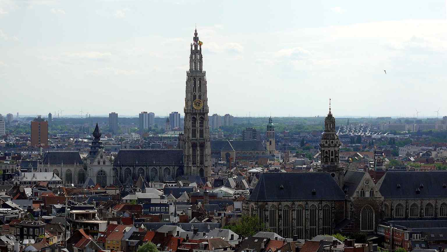 A high, wide view of St. Paul’s Church in Antwerp with the Scheldt in the background — a reminder of the church’s riverside setting near the old port and sailors’ district.