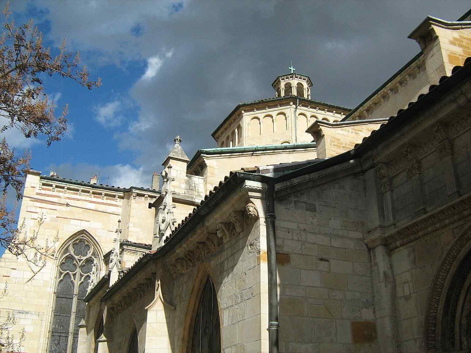 The north façade, where the building’s layered history becomes visible in its walls, towers, and later modifications.