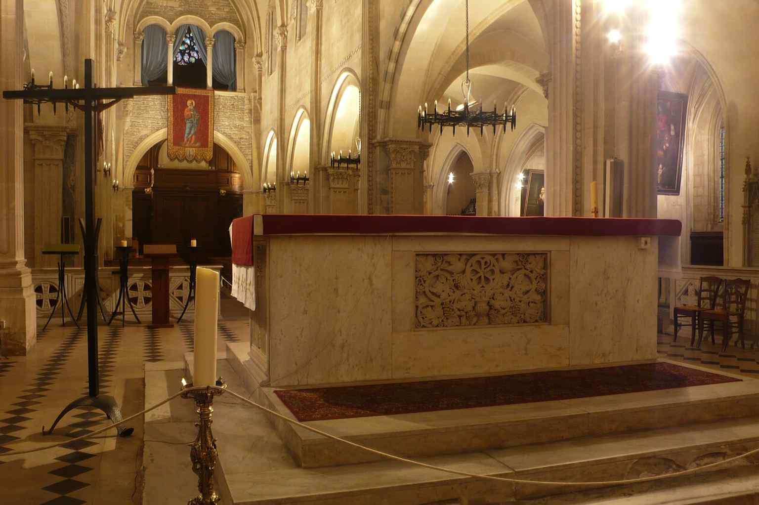 A look down the nave from the altar, revealing the Romano-Gothic interior restored after the 19th-century campaigns.