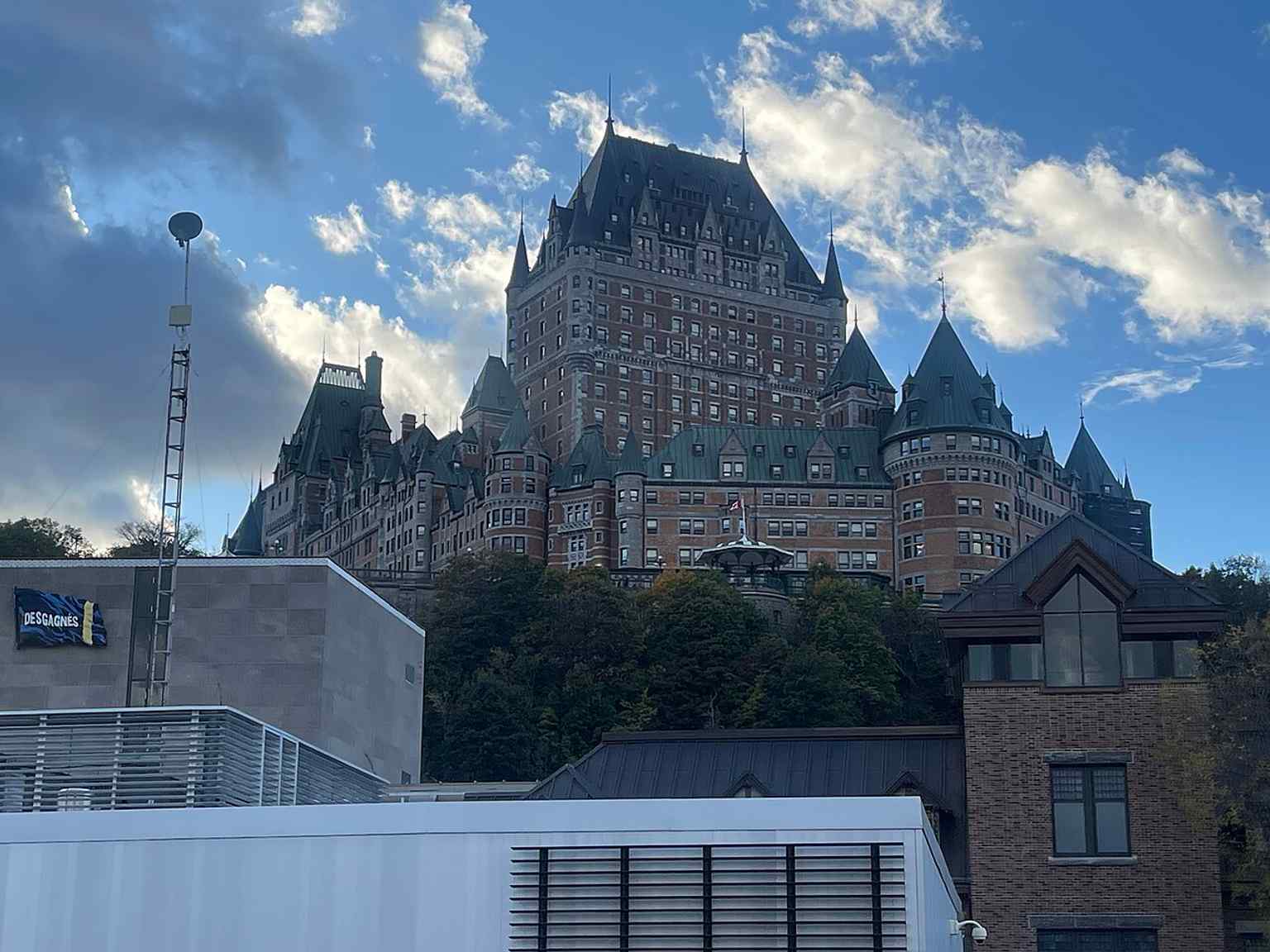 Viewed from the water, the hotel rises above Quebec’s cliff edge, emphasizing the promontory site that made it a landmark on the St. Lawrence River.
