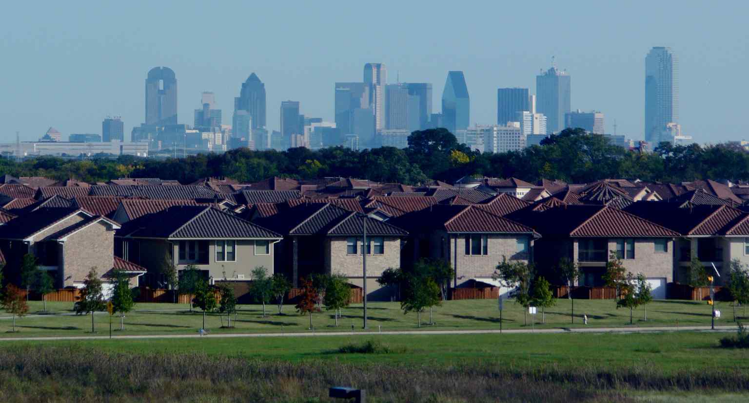 The Renaissance Tower, visible here in the 2009 Dallas skyline, became the second-tallest building in the city after a 1986 renovation added a 176-foot spire to boost its overall height to 886 feet.