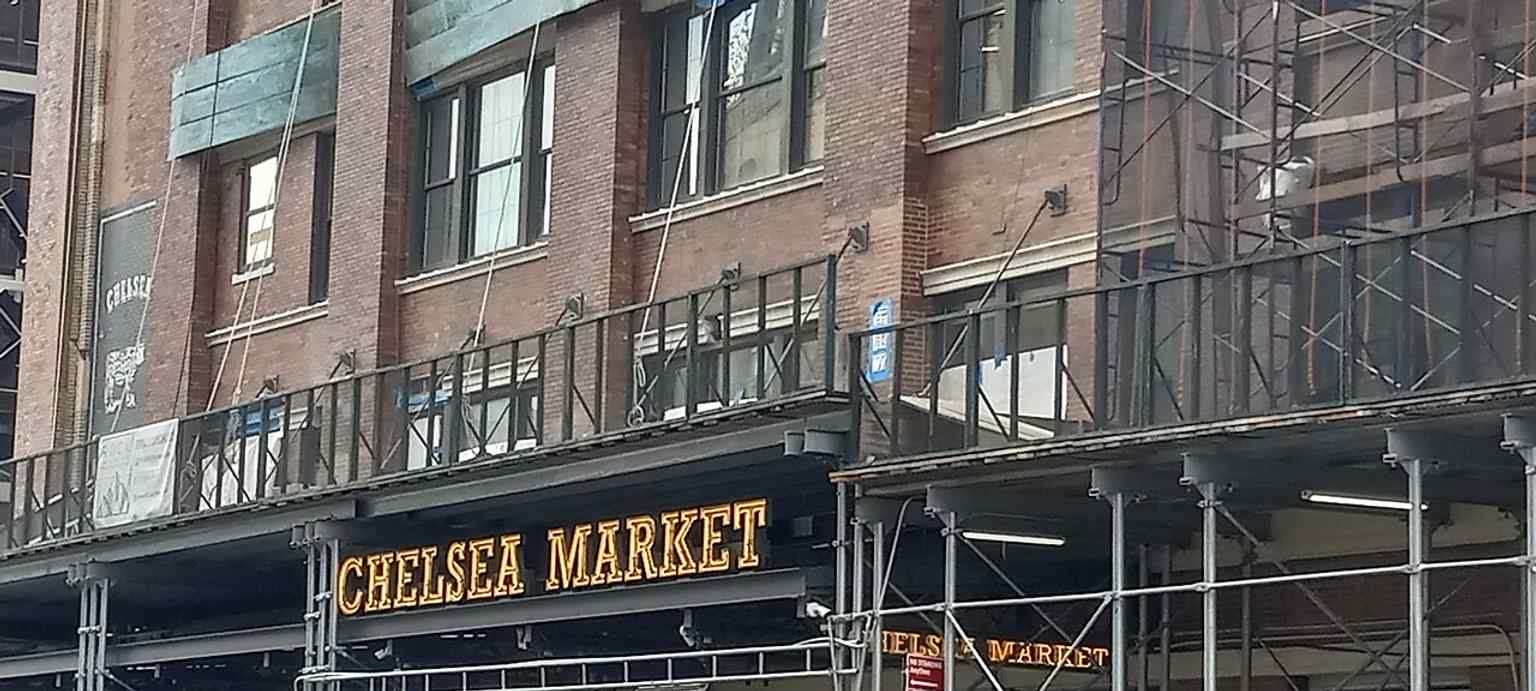 Chelsea Market’s long street-facing facade in Manhattan, reflecting the scale of the former factory complex.