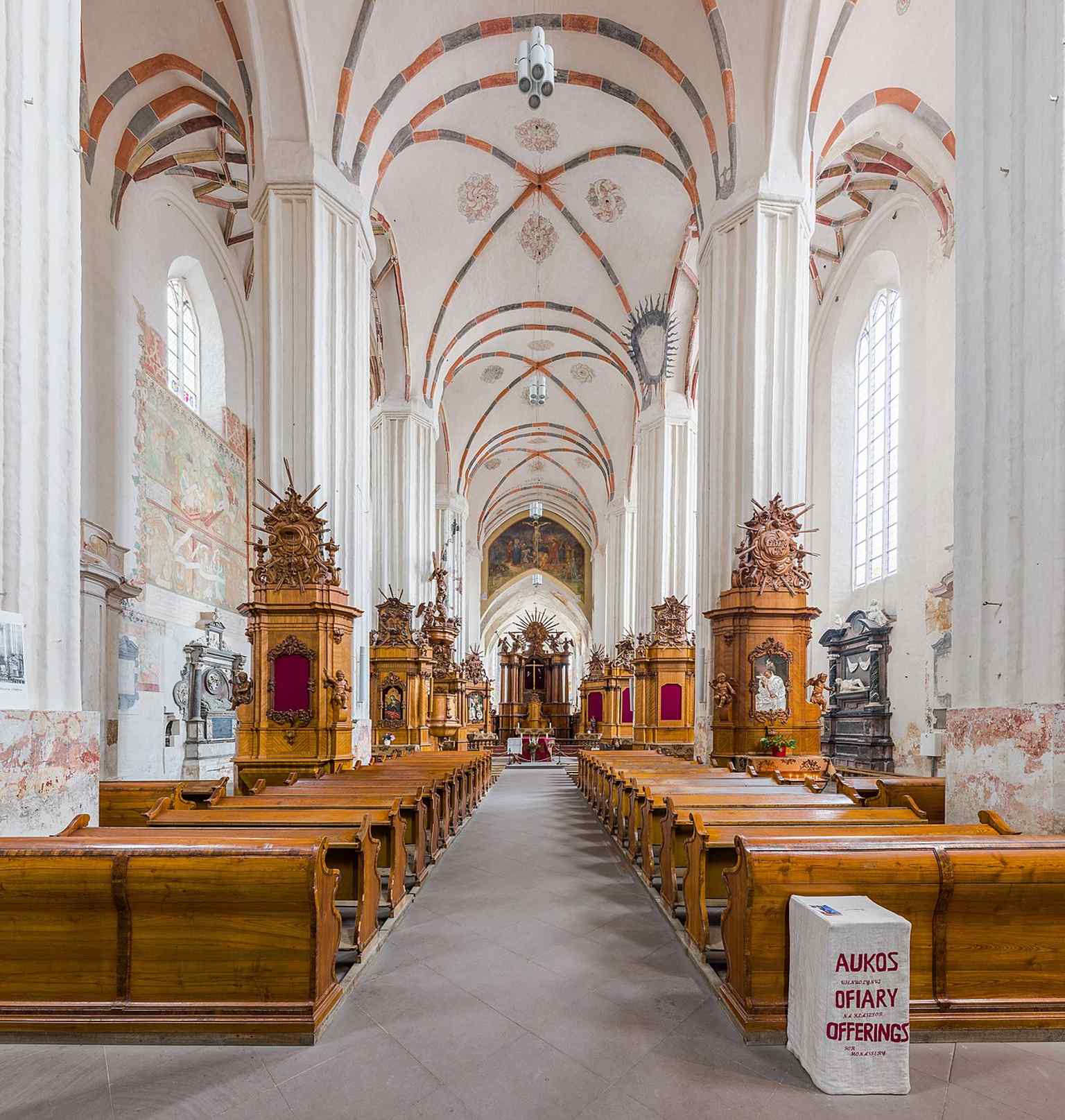 Wide view of the Gothic nave inside Bernardine Church, showing the tall pillars and scale that made it one of Vilnius’s largest sacral buildings.