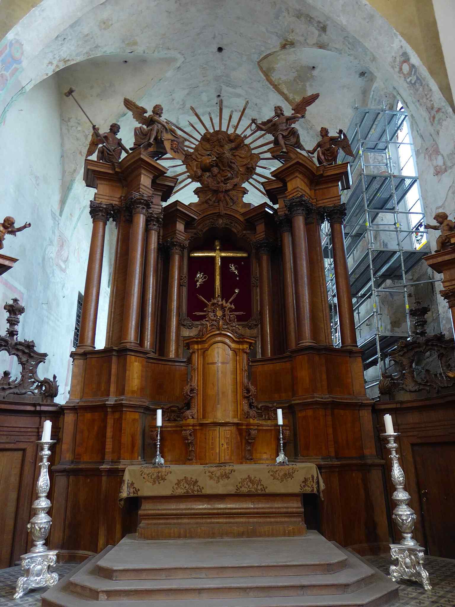 The main altar inside the church, where centuries of worship continued even after the building was repurposed in Soviet times and later returned to the Franciscans.