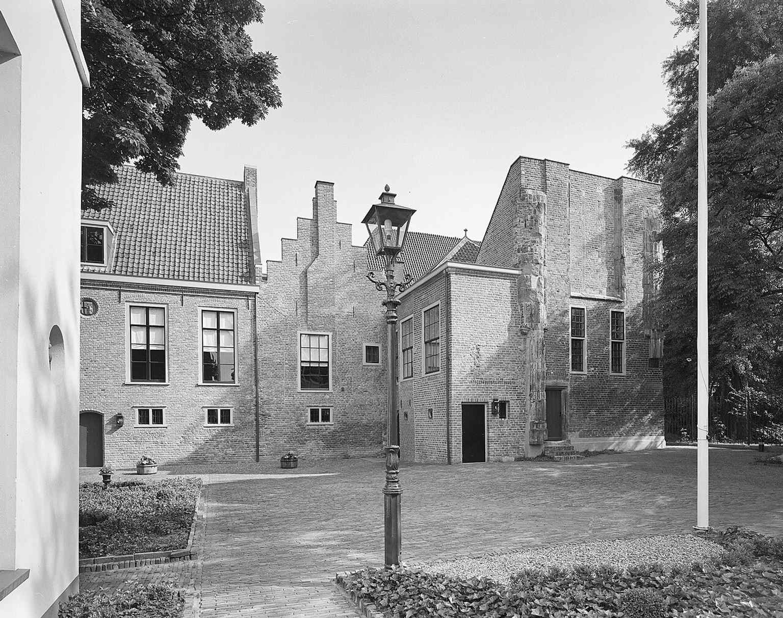 The tranquil inner courtyard and the 15th-century Commander's house, which now serves as the headquarters for the Bailiwick of Utrecht charity.