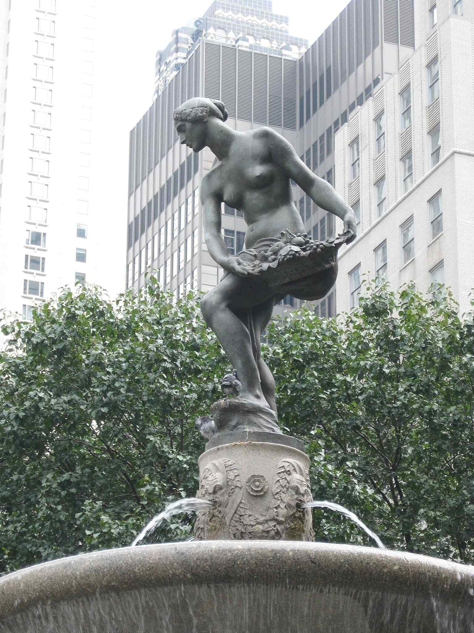 A view of the Pulitzer Fountain, crowned by the allegorical bronze statue of Pomona, goddess of abundance, holding a basket of fruit.