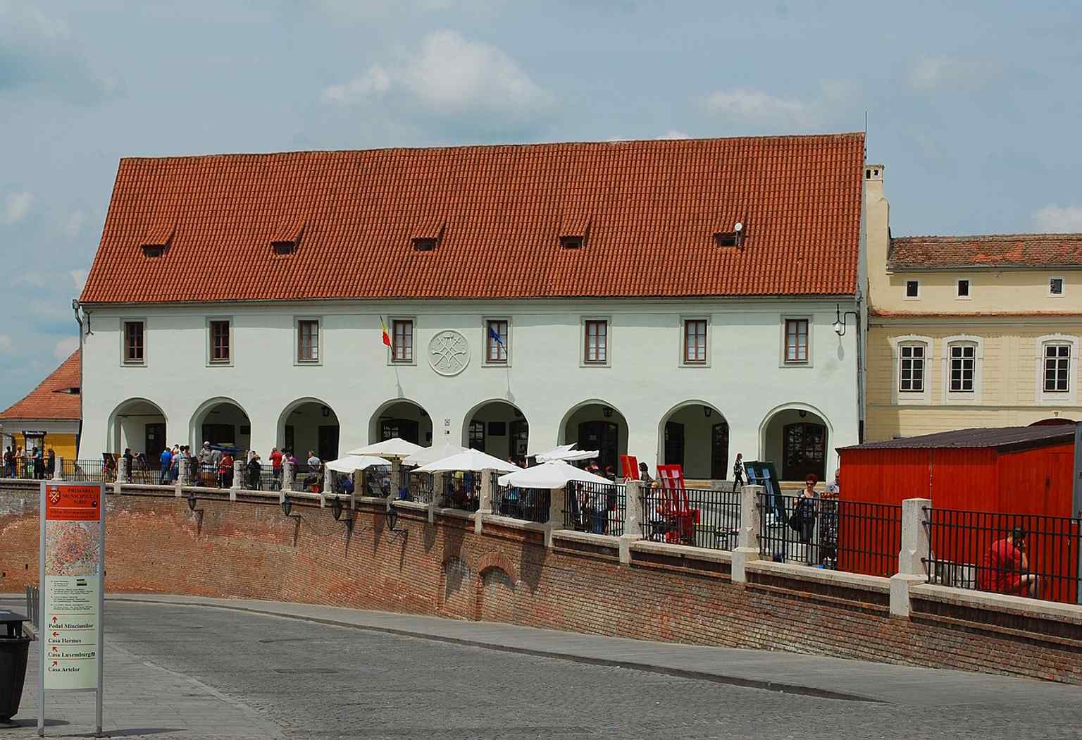 A high-resolution exterior view of the Casa Artelor, formerly the Butchers' Hall, which now hosts the 'Emil Sigerus' Museum.