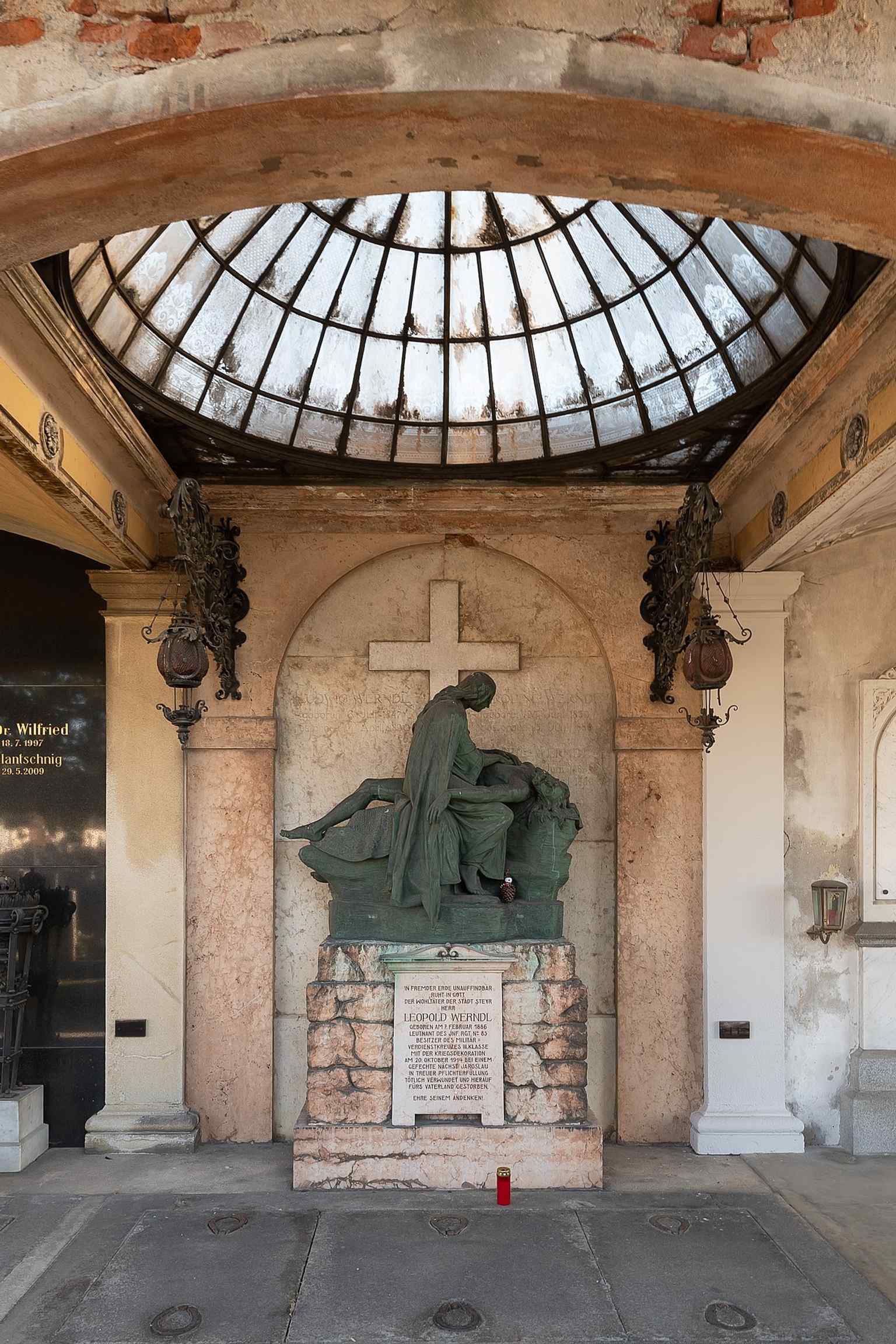Leopold Werndl’s vault with a commemorative plaque, reflecting how family graves were later adapted and remembered.