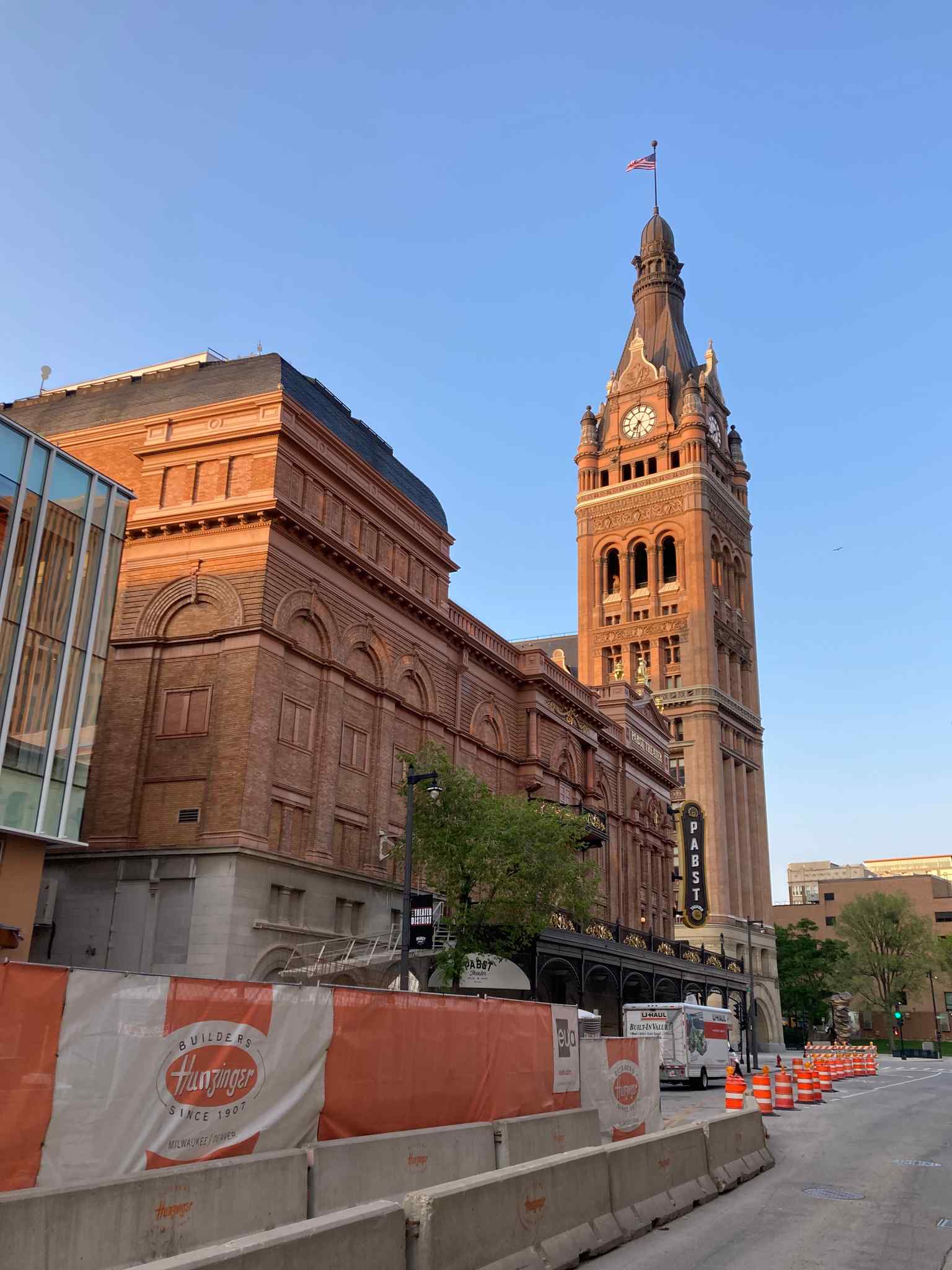 The Pabst Theater stands proudly alongside Milwaukee City Hall, emphasizing its status as a significant City of Milwaukee Landmark in its urban setting.
