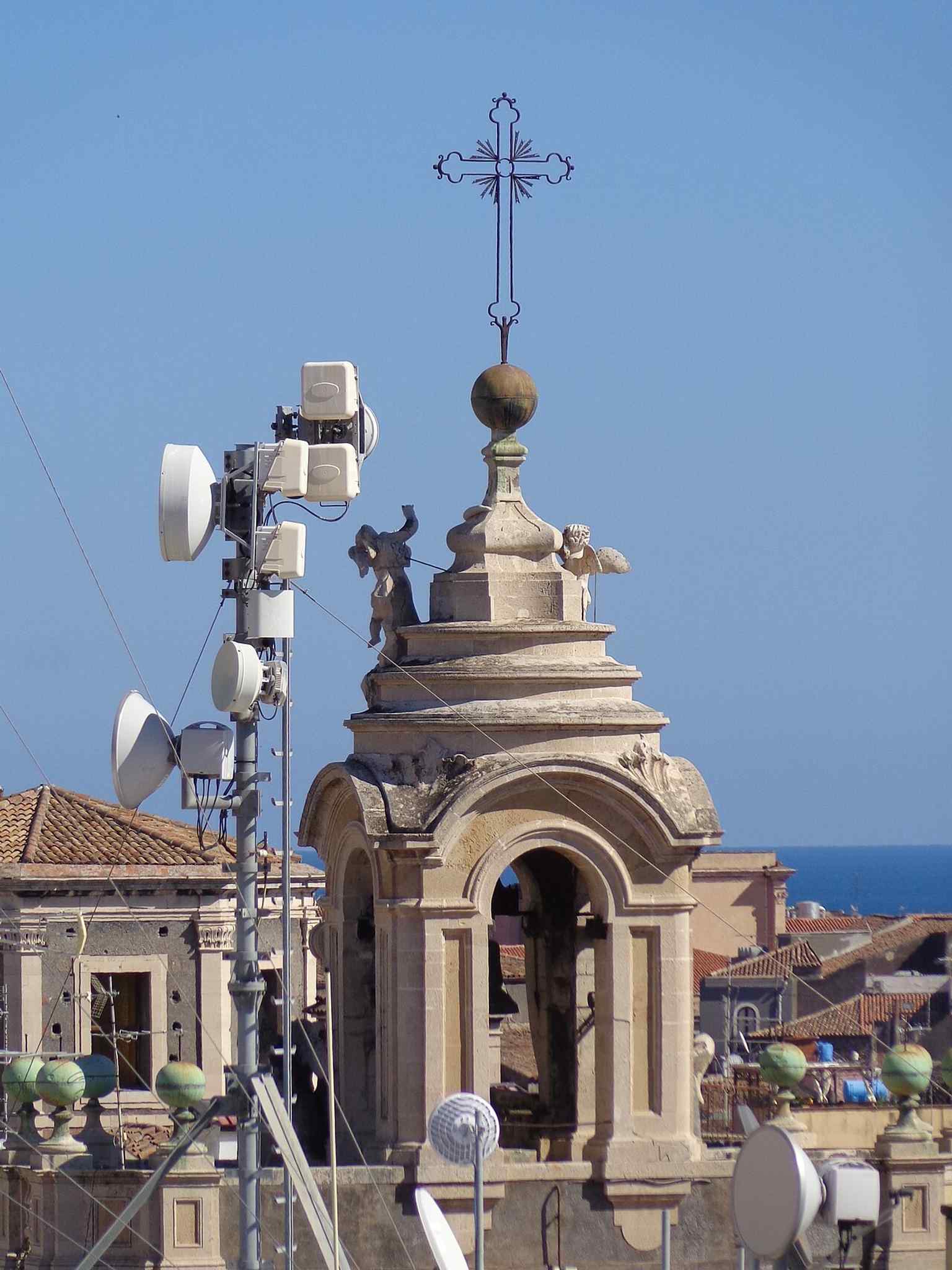 The bell tower seen from San Giuliano’s dome shows how the church’s profile became part of Catania’s skyline.
