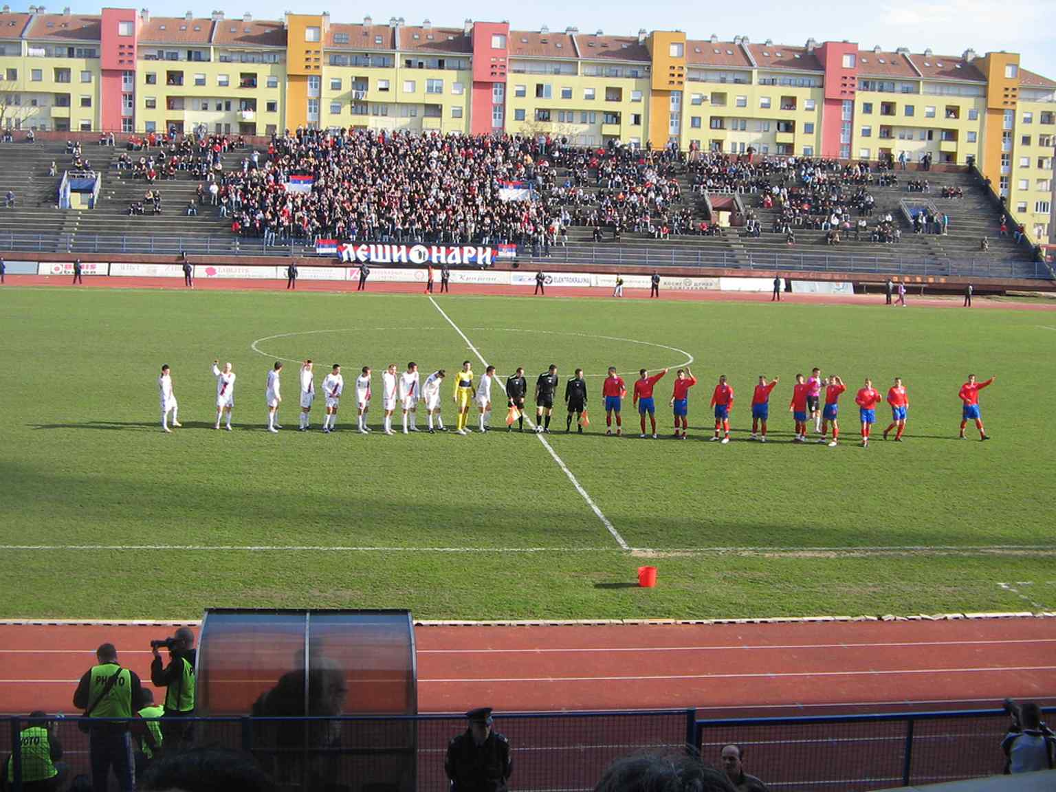 Spectators fill the stands during a football match at the Banja Luka City Stadium, which has a capacity to hold over 10,000 seated spectators.