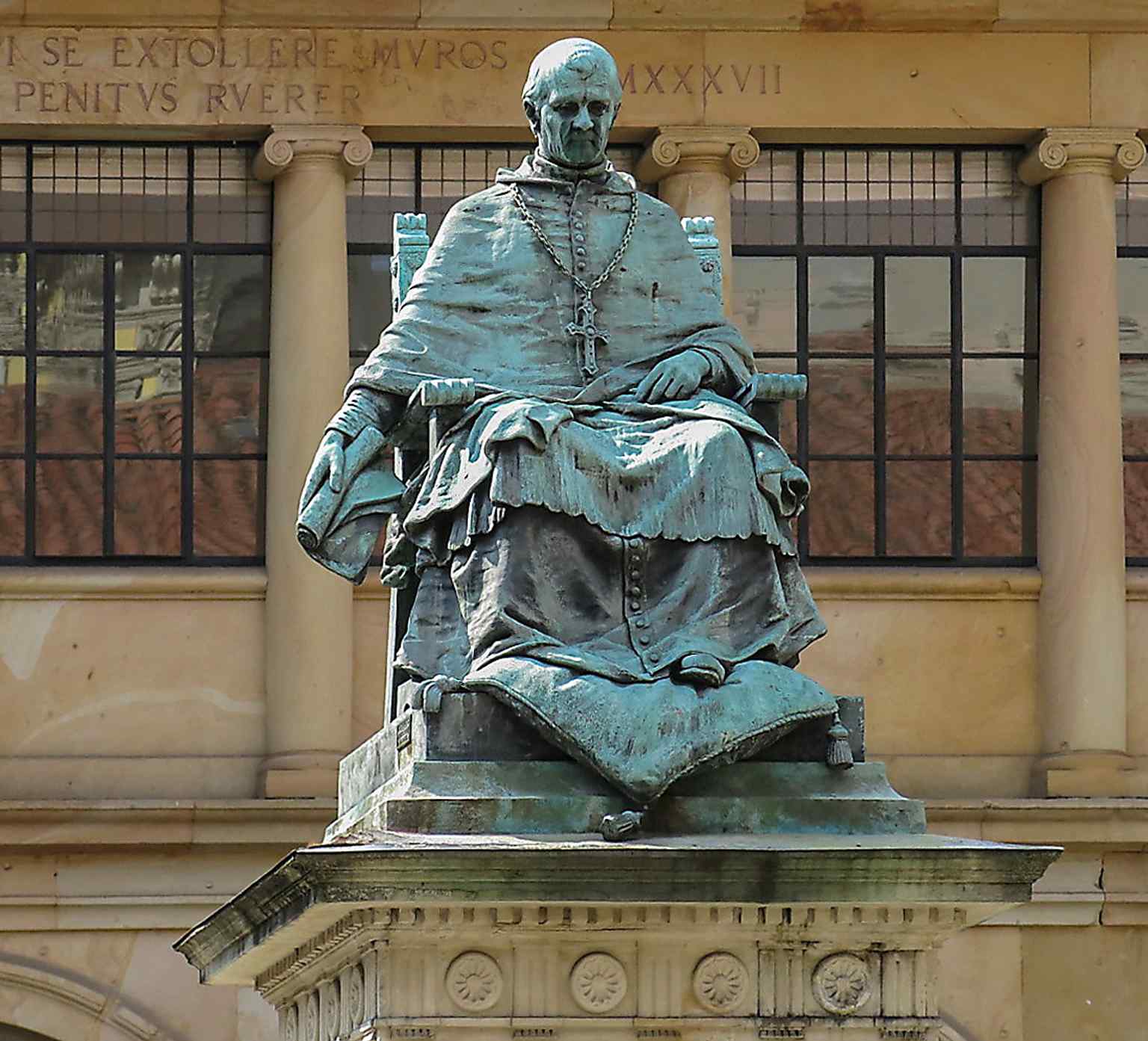 Statue of Fernando Valdés Salas in the old cloister — the archbishop who founded the University of Oviedo in 1608.