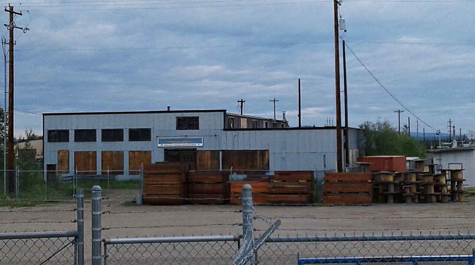 The machine shop’s steel-frame exterior, photographed in 2016 — the building that supported Fairbanks Exploration Company’s gold-mining operations and was listed on the National Register in 1995.