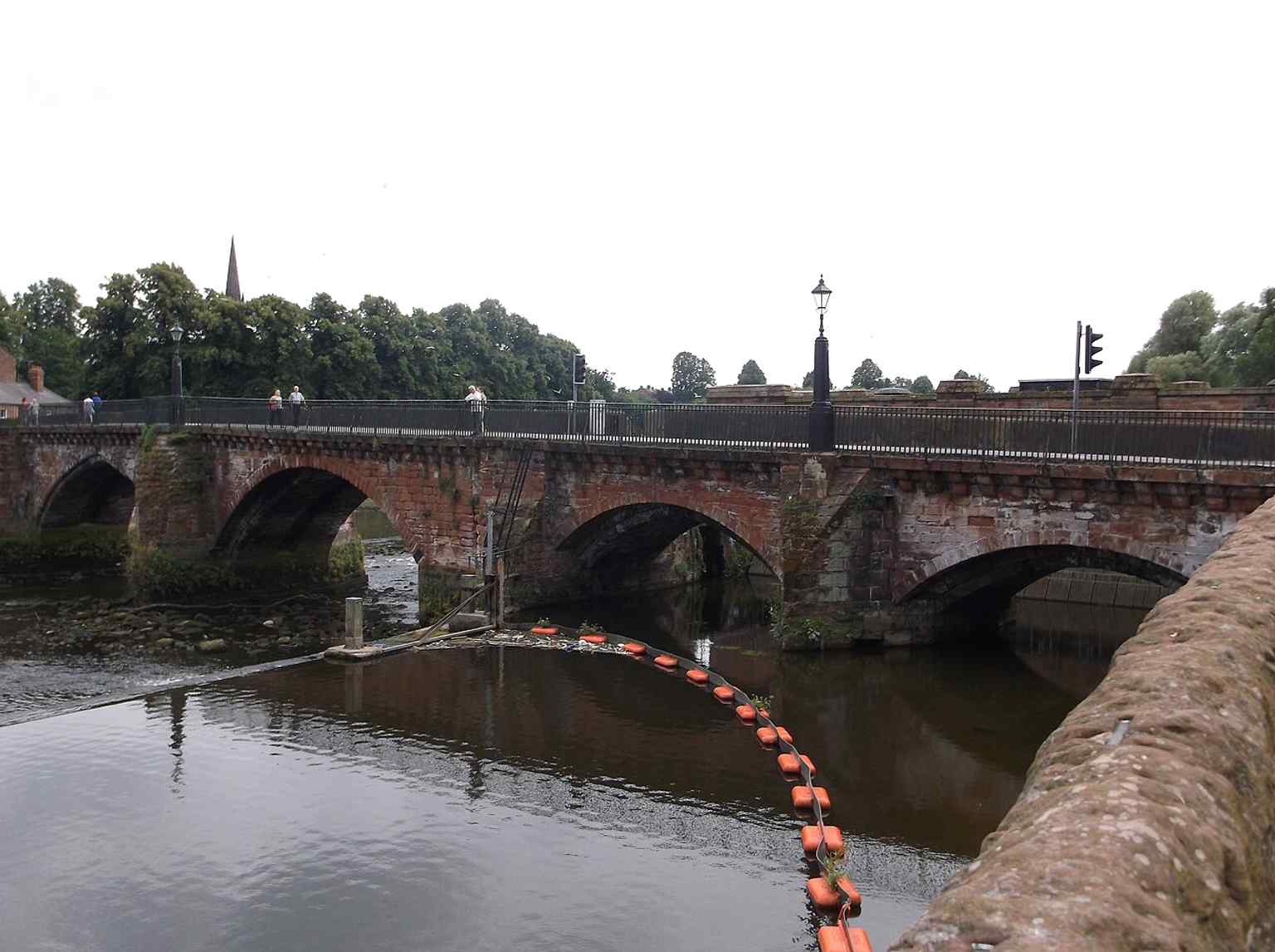 Classic view of Old Dee Bridge by Bridgegate, showing the surviving medieval crossing that links Chester to Handbridge.