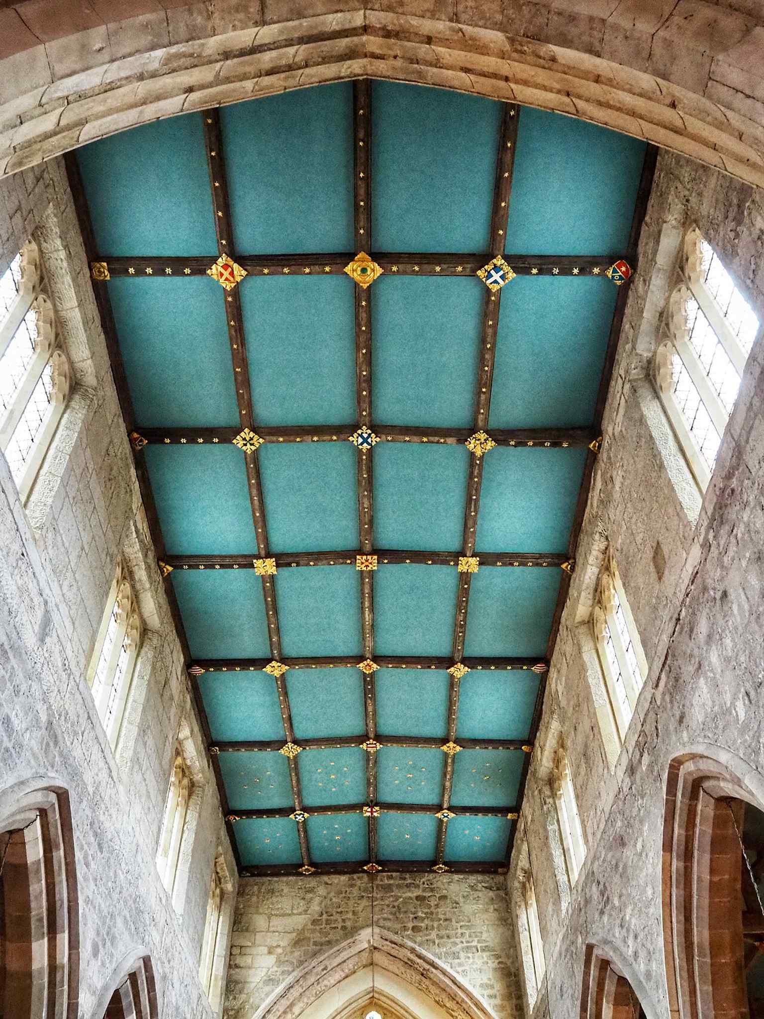 The decorated ceiling and roof structure, part of the 19th-century restorations that reshaped the church interior.