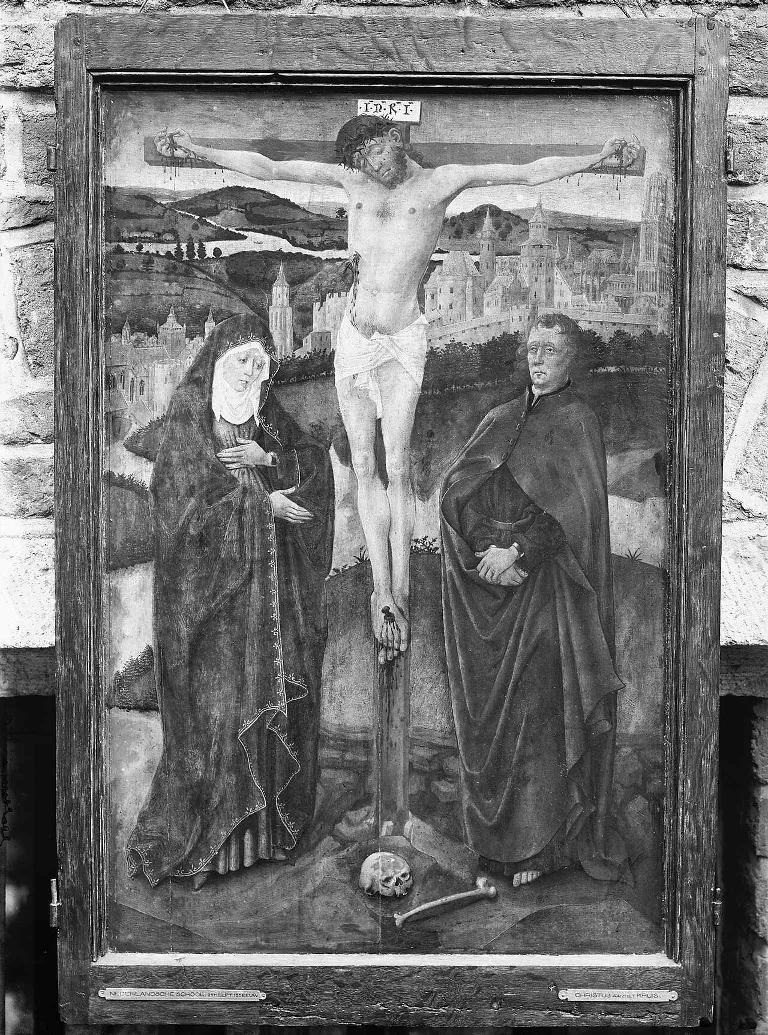 This 15th-century Dutch triptych features the Buurkerk and Domtoren in the background, showcasing its appearance in the city centuries ago.