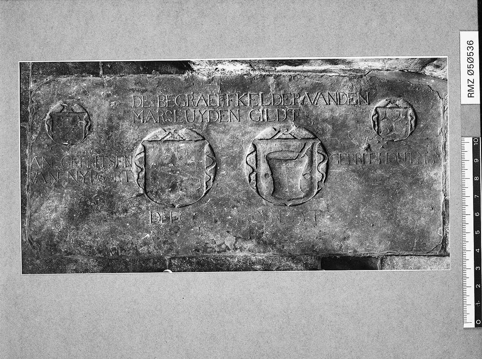 A gravestone belonging to the Market Bell Ringers' Guild, connecting to the church's significant bell collection which included both city and church bells.