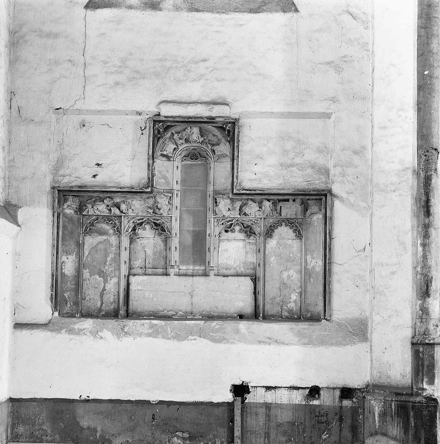 An altar retable that hints at the church's grand interior, which was extensively beautified with additions like an organ and a copper choir screen between 1456 and 1499.