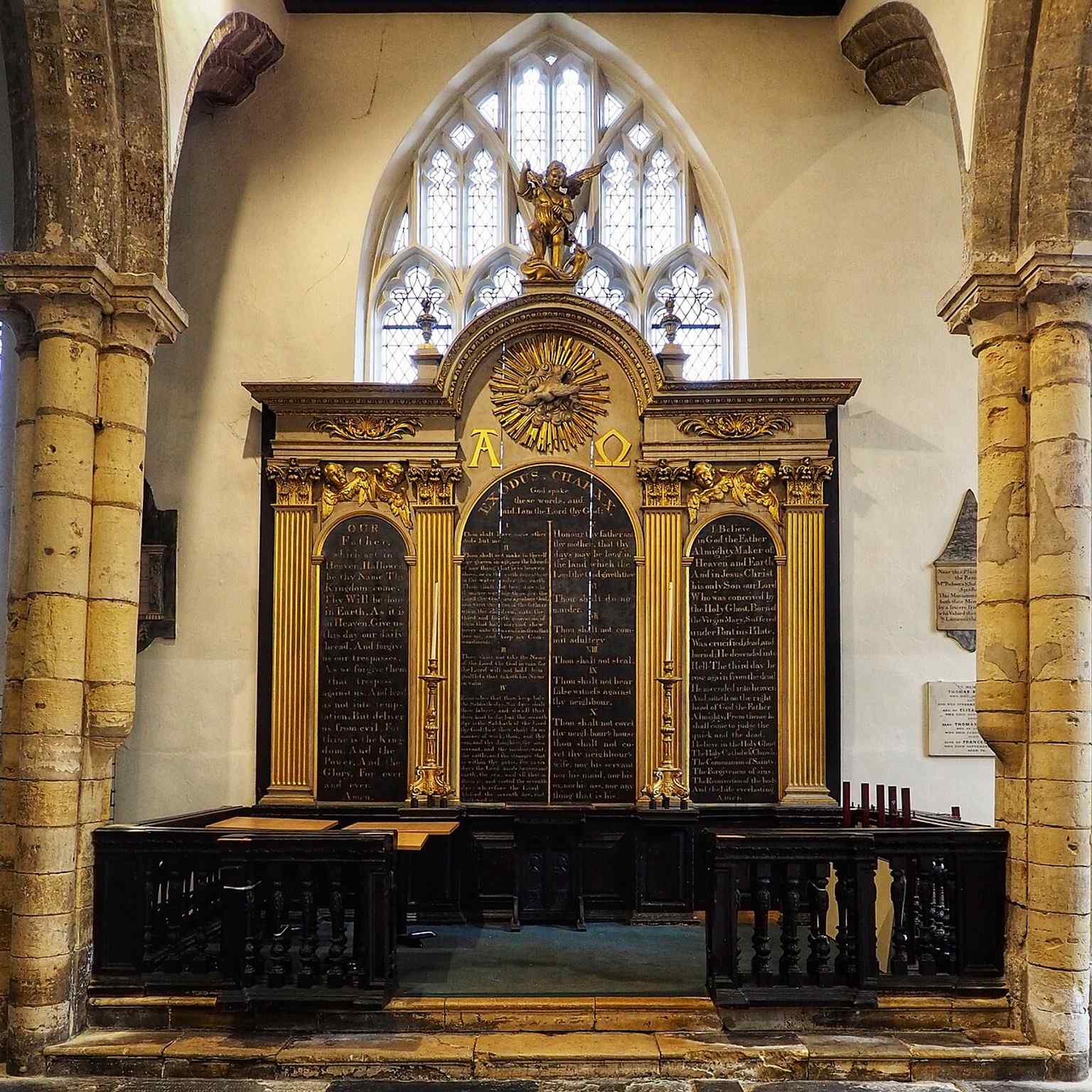 The reredos inside St Michael’s shows the church’s later interior life after its 20th-century closure and conversion, when the building reopened as a café and restaurant in 1989.