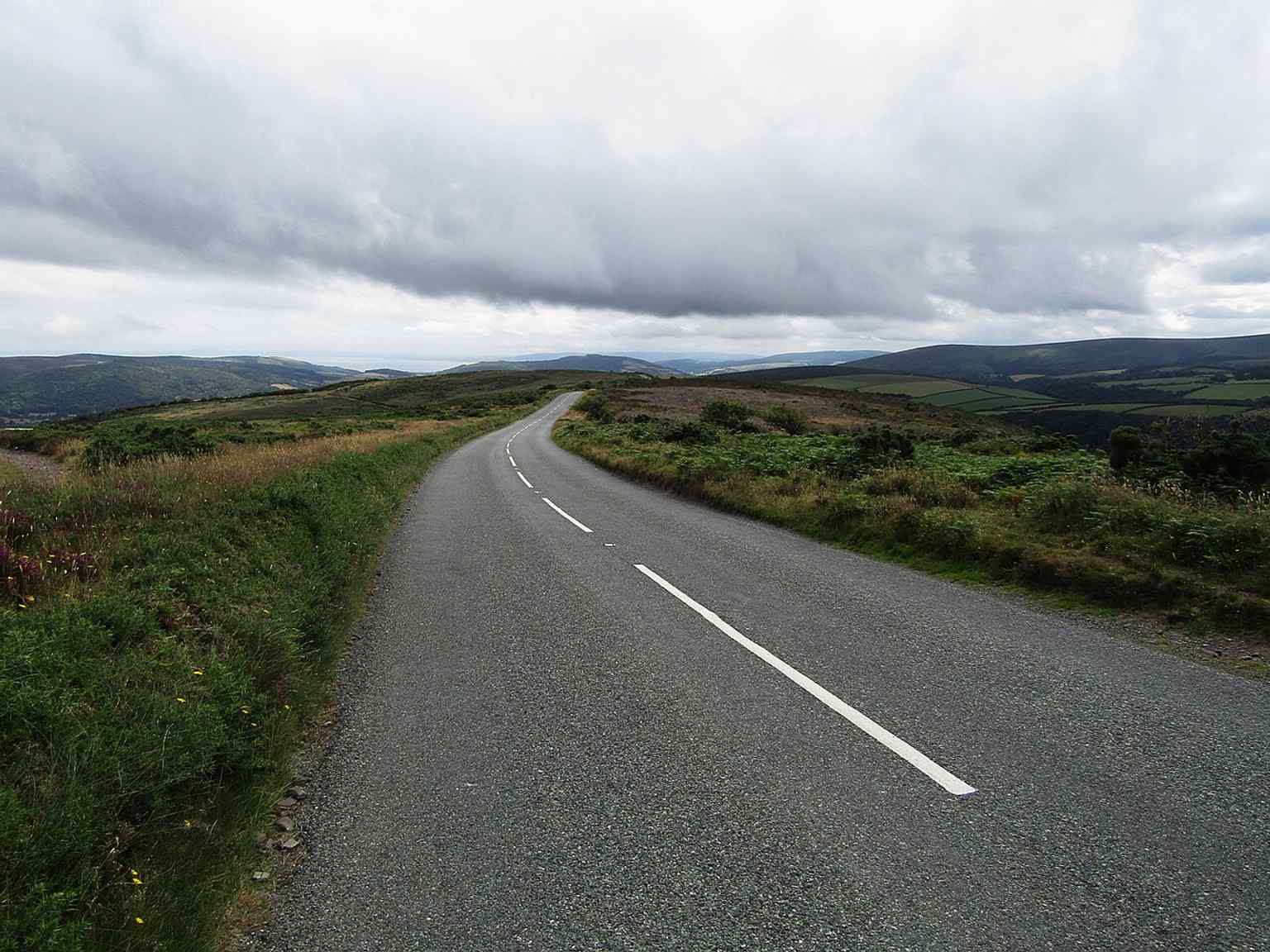 The A39 at Whitstone Post near Porlock, one of the steep Exmoor stretches linked to the route’s dramatic hill climbs and rescue history.