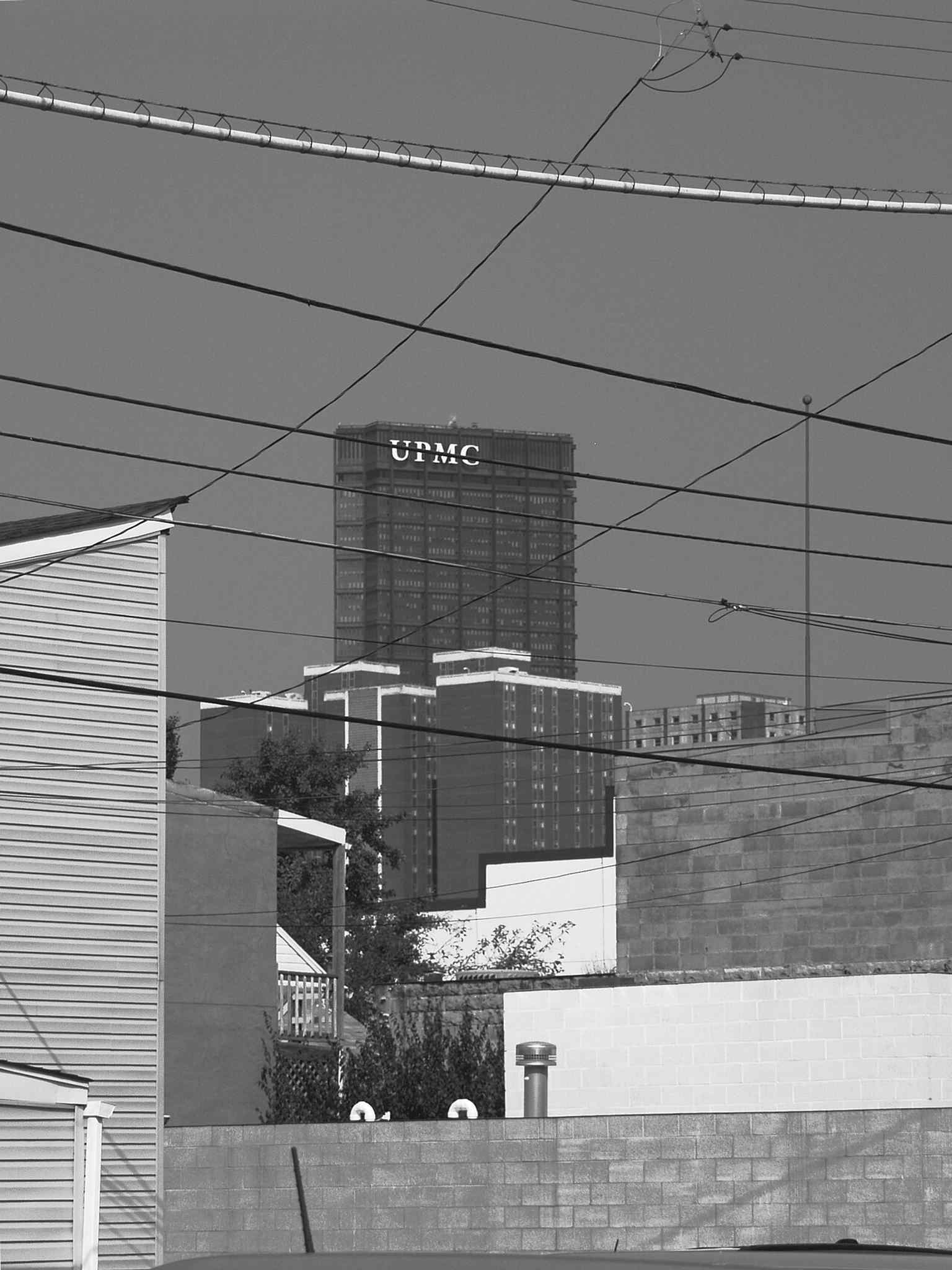 A black-and-white view of the U.S. Steel Tower from the South Side offers a dramatic perspective, highlighting its robust form as a symbol of American industrial strength and innovation.