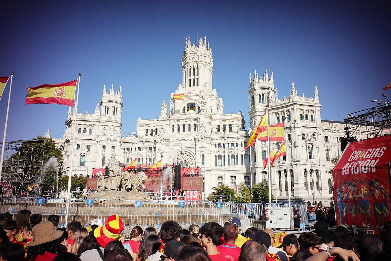 A celebration crowd filling Cibeles in 2024, echoing the square’s long role as Madrid’s favorite place for sporting victories.