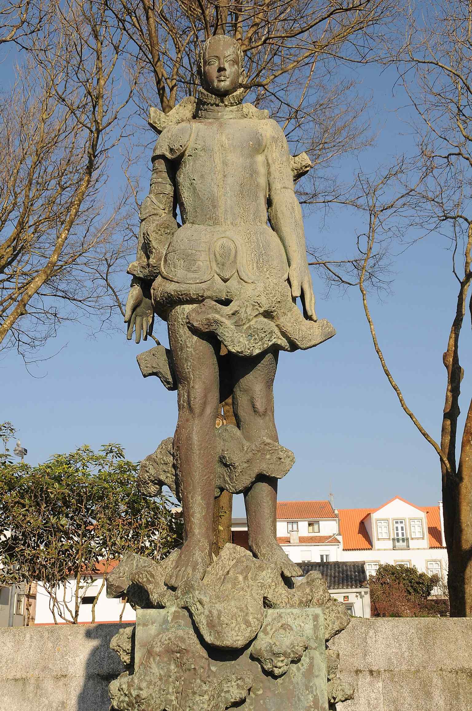 Another angle on the statue in Praça D. Sebastião, showing the monument placed in the square that helps anchor the town’s founding memory.